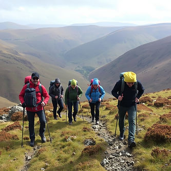 small group walking in the brecon beacons wearing technical kit.jpg