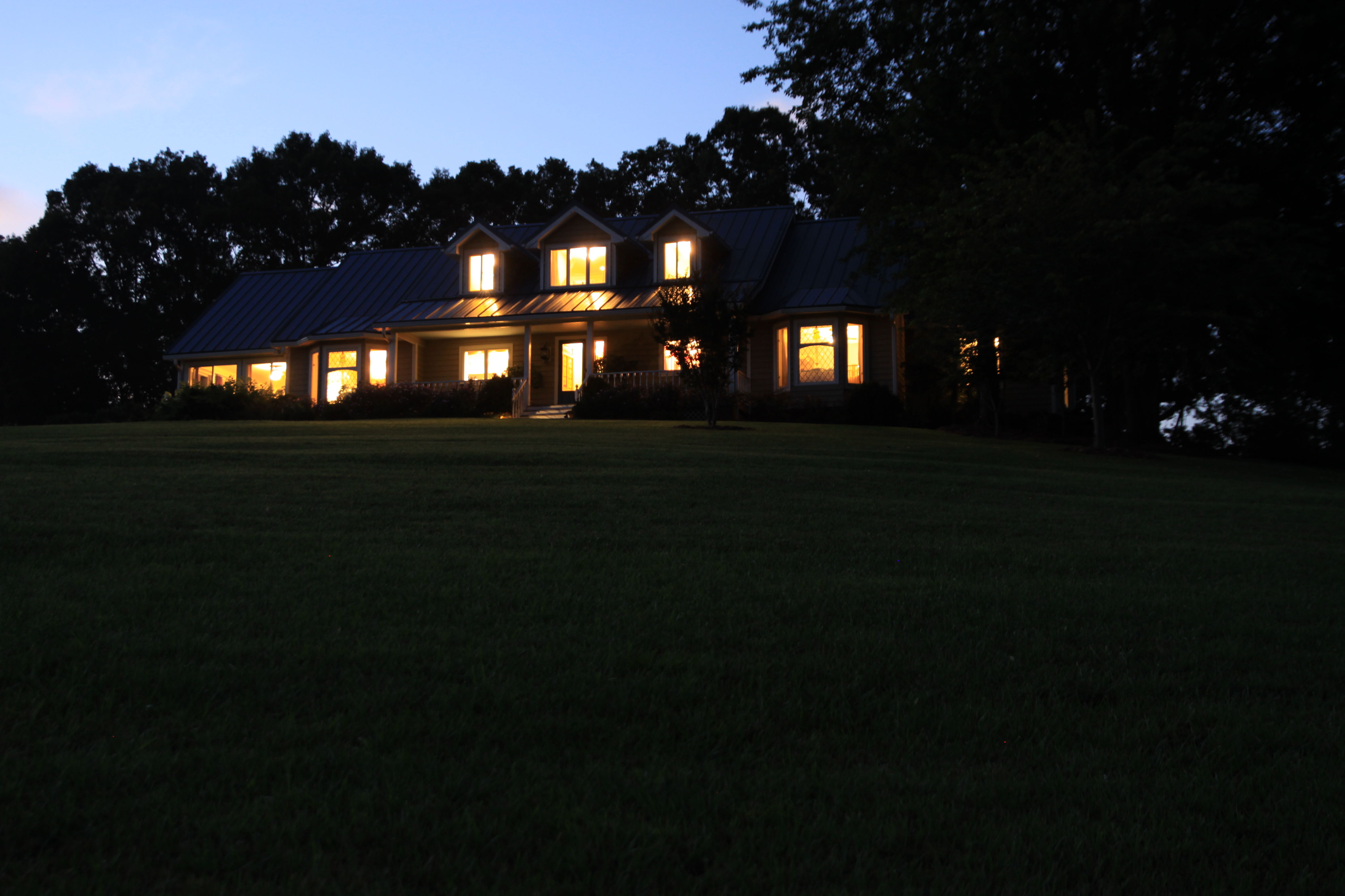 front view of house at dusk
