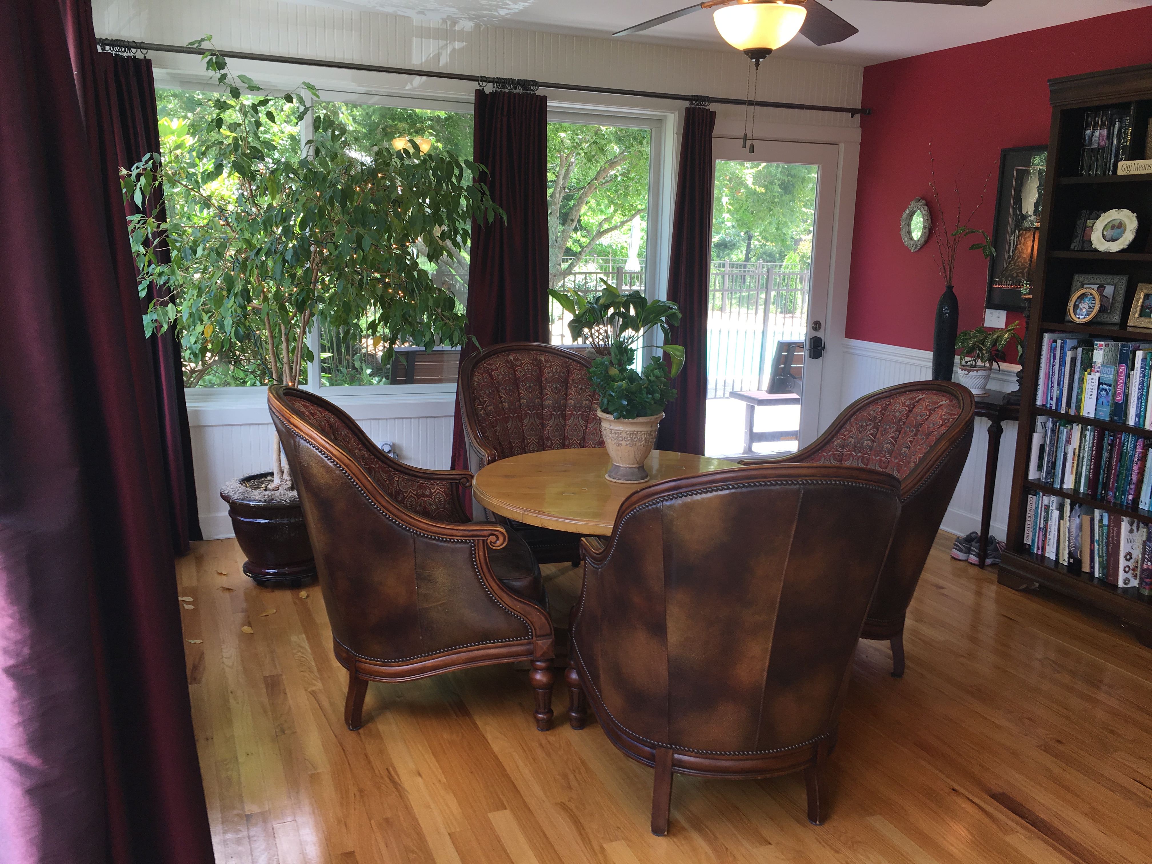 sun room table and overstuffed chairs