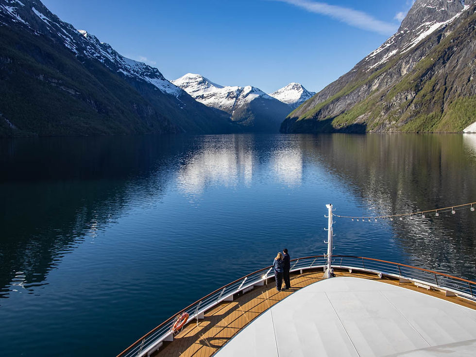 Travelers enjoying ocean views during a destination-focused small-ship cruise