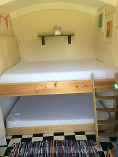 inside the Suffolk hay cart / shepherds hut at swattesfiel campsite