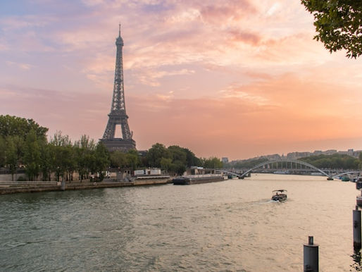 The Eiffel Tower viewed across the River Seine at sunset