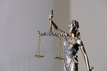 Bronze statue of Justice holding her scales