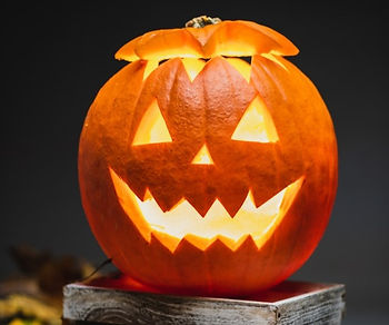 Pumpkin glowing in candle light