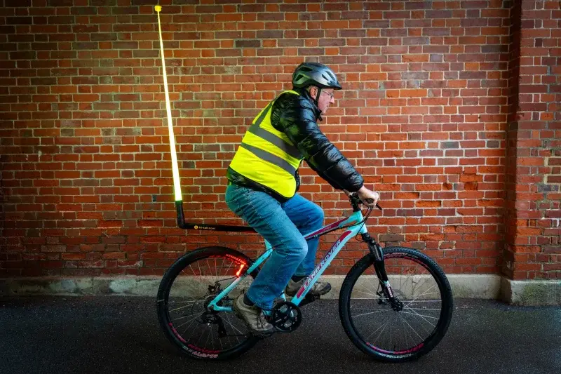 Cyclist with a Hi-Tail light on the back of his bike