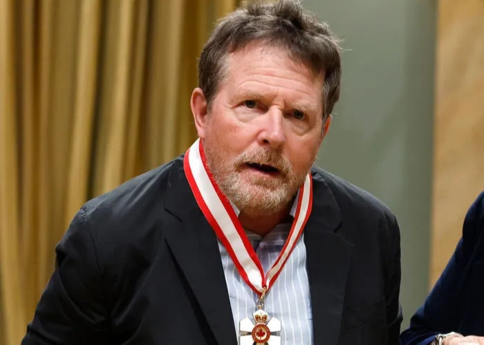 Michael J. Fox wearing his Order of Canada medal around his neck