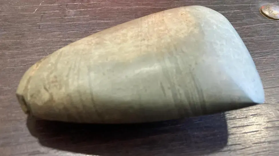 5,000-year-old highly polished Neolithic stone axe head
