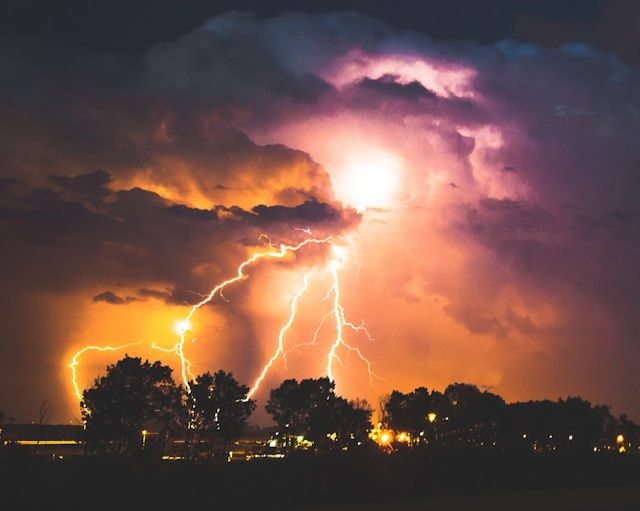 Huge storm cloud above a lightning strike