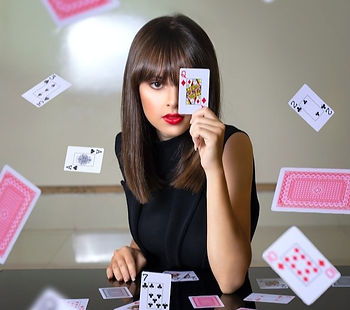 Female magician doing a card trick