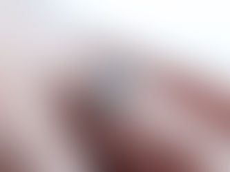 Woman wearing a sapphire engagement ring