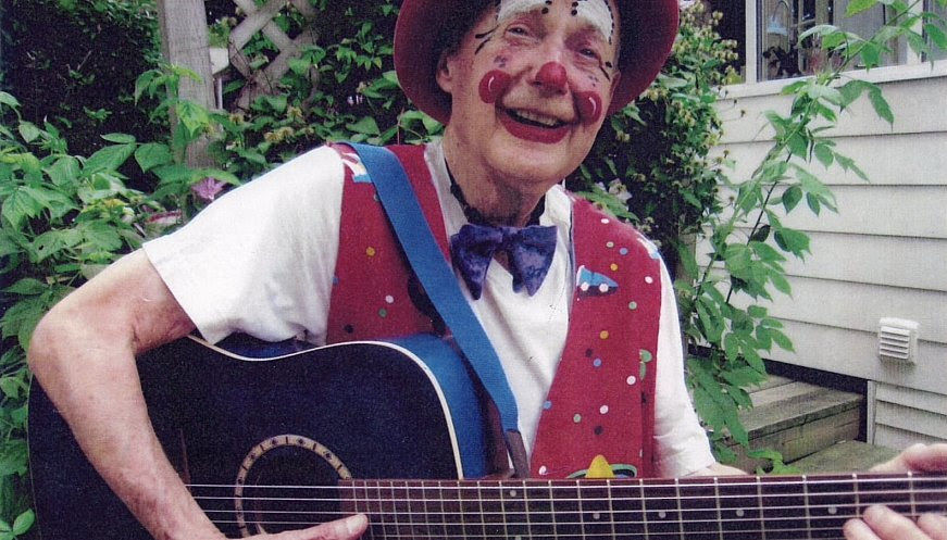 George Linton playing his guitar