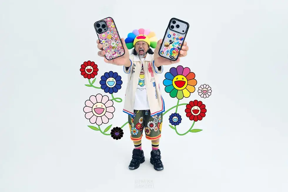 Japanese artist Takashi Murakami holding a floral phone case design