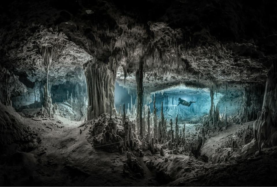 Diver in a flooded cave in Yucatan, Mexico