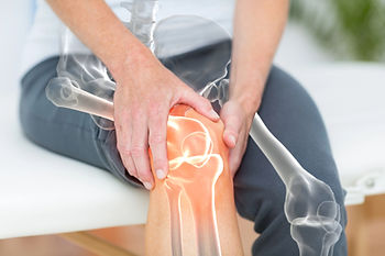 Man receiving treatment for muscle and joint discomfort