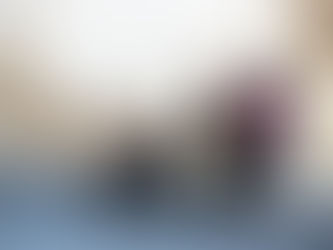 Elderly man being assisted by his carer