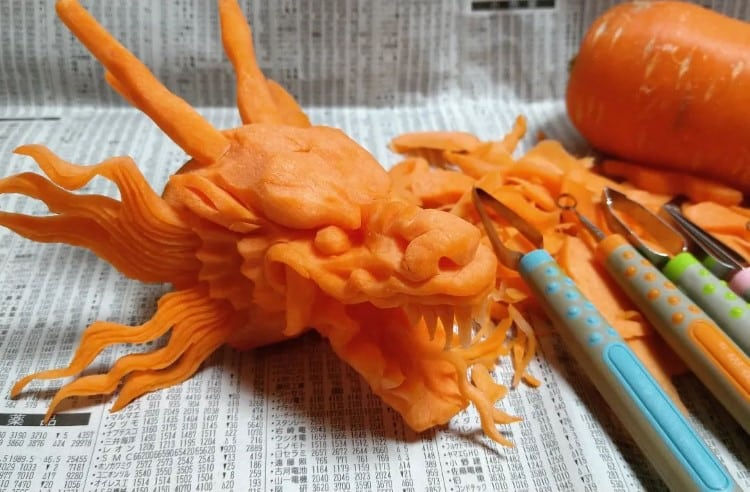 Carrot carved to look like a dragon's head