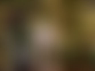 Bottle of Champagne and two glasses, ready for celebrating good news