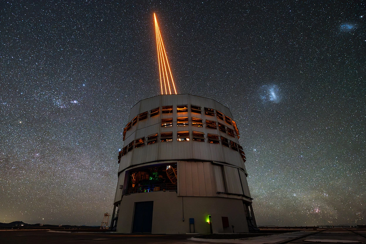 Laser beams shooting into the night sky
