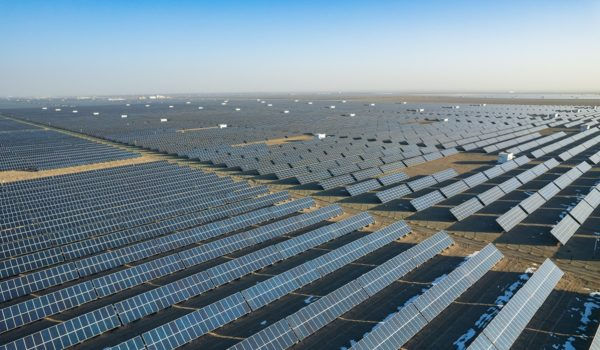 Desert landscape covered in thousands of solar panels