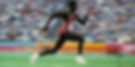 Carl Lewis running in the 1984 Olympics