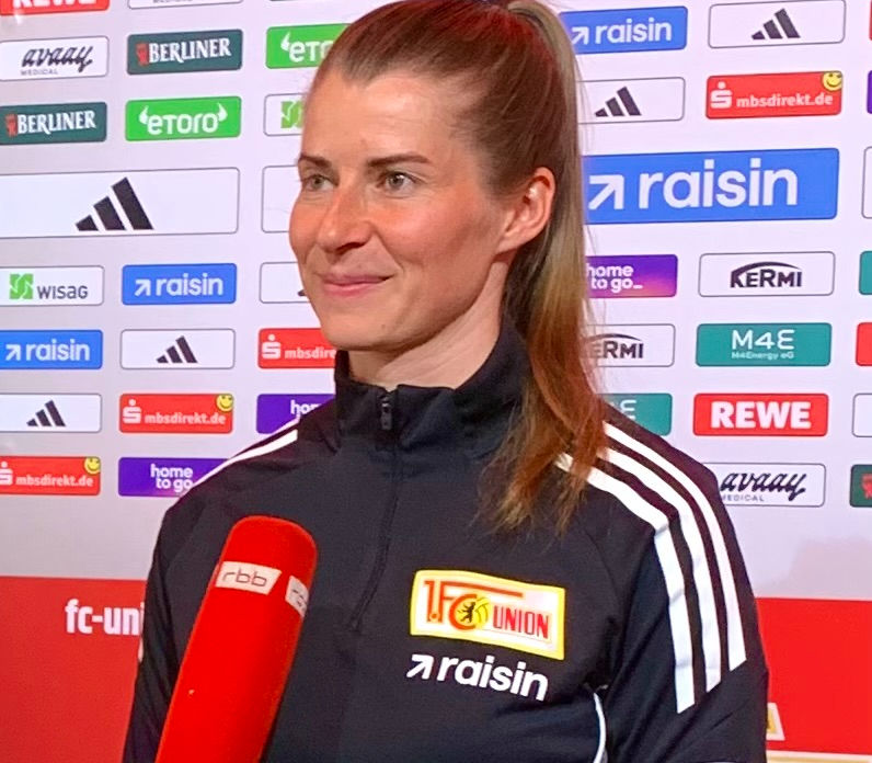 Marie-Louise Eta wearing a tracksuit