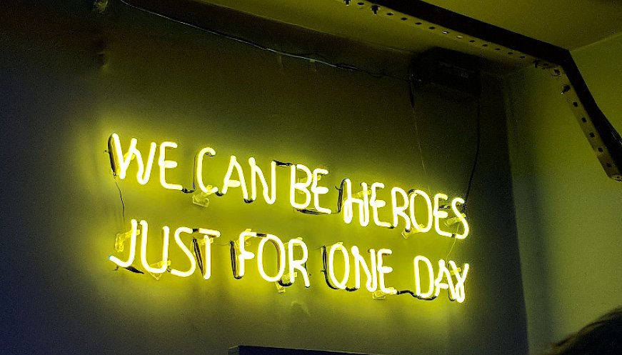 Sign saying: We can be heroes