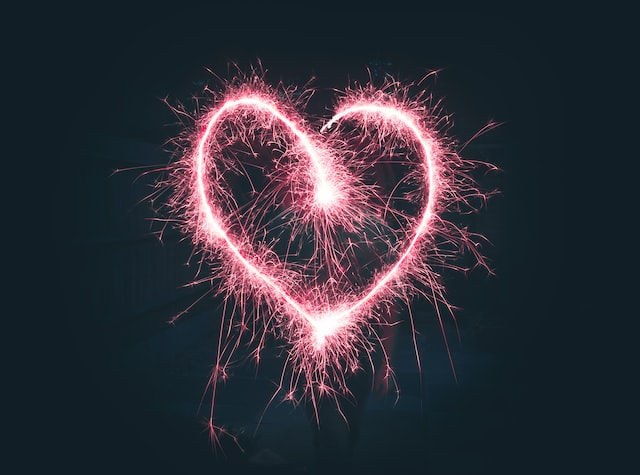 Heart shape made from pink sparklers