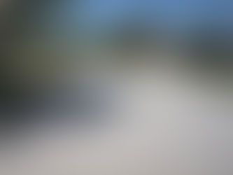 A cream-coloured reflective street in Los Angeles