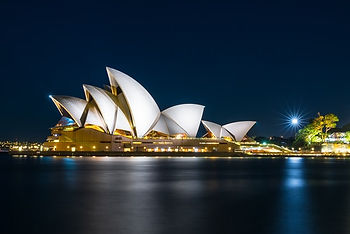 Sidney opera house illuminated at night