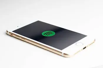 Spotify logo on an iPhone.