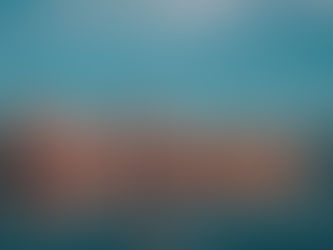 Traditional dhow by Dubai Creek at sunset