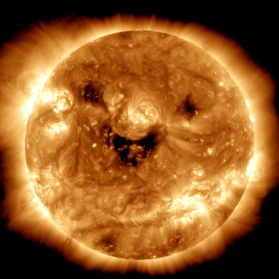 Image appearing to show the sun smiling