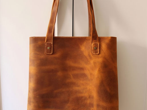Small light brown leather handbag