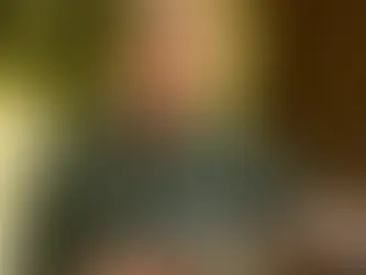 Prince William wearing a green shirt