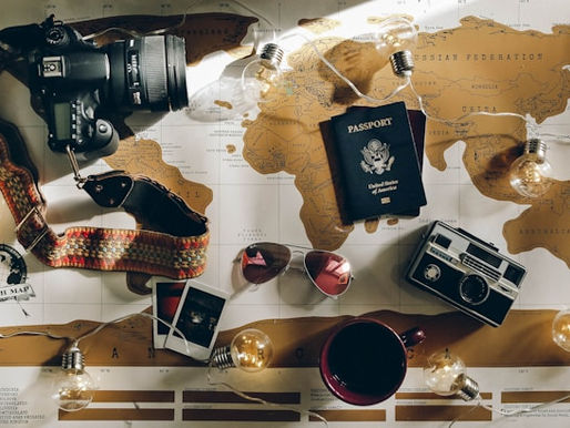 Traveller looking at a map of the world 