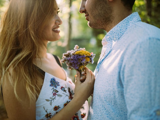 Man holding his girlfriend in an embrace