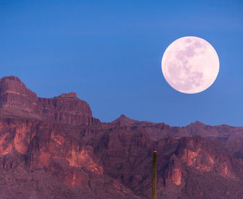 Supermoon rising above Idaho mountains
