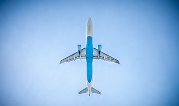 Commercial jet seen flying directly overhead