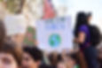 Protester holding a sign saying: 'There is no planet B'