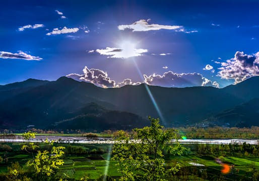 Sun shining through clouds over Khyber Pakhtunkhwa, Pakistan