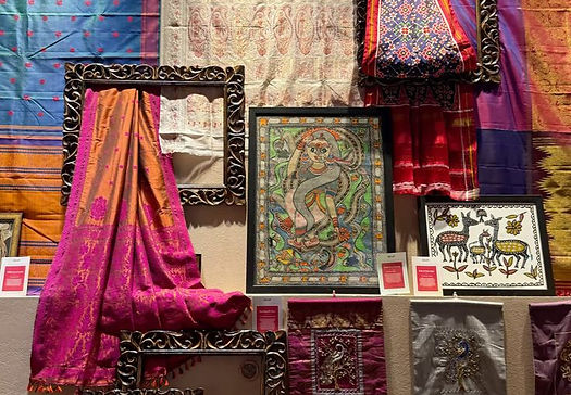 2026 Theme Image of saris and fabric materials to showcase theme example.