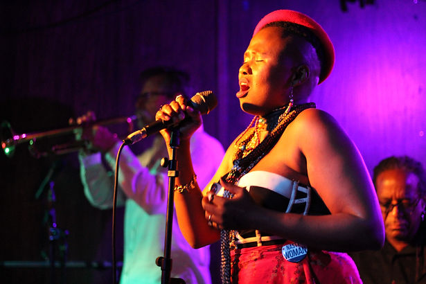 Thabz singing at Cafe 9 - 2019.JPEG
