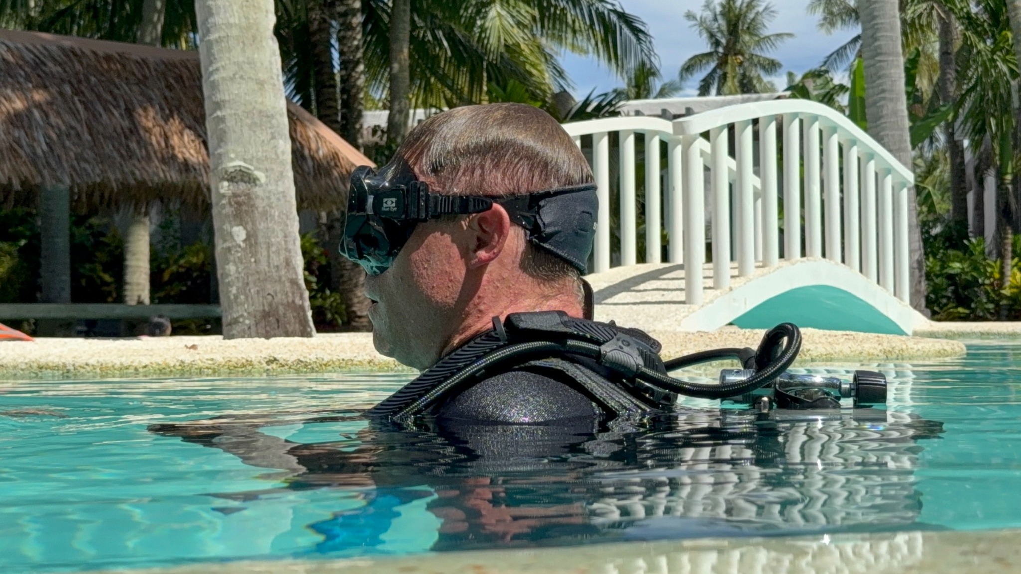 Scuba diver practicing in the pool at Pili Beach Resort