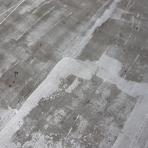 hotel roof damage circular spots