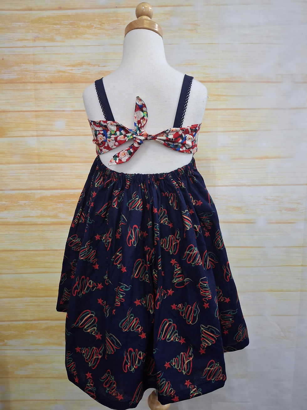 Thumbnail: Ava Dress Santas and Navy Trees Size 6