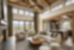 Grand open-plan living room with vaulted ceilings, exposed oak beams, a circular black iron chandelier, a curved cream boucle sofa, an organic burl wood coffee table, rounded boucle swivel chairs, and a timber frame pass-through opening to a warm wood kitchen with dark island beyond.