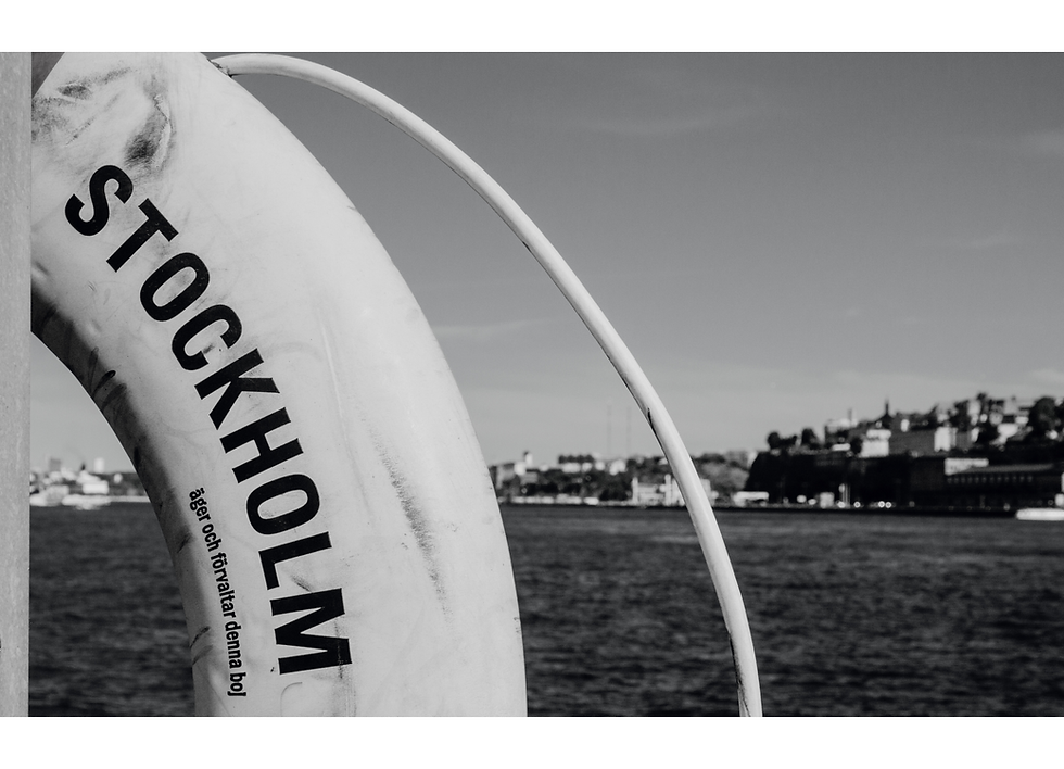Black and white picture of a life ring (preserver) that says Stockholm on it).