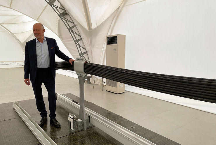 uSky Transport - Dr. Anatoli Unitsky with track structure mockup