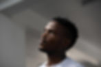 Professional portrait photography of a man looking upward