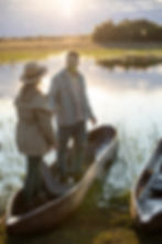 Couple by a lake at sunset shot by commercial photographer cape town